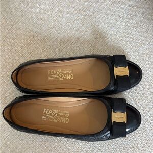 Salvatore Ferragamo Black Flats with Gold Accent